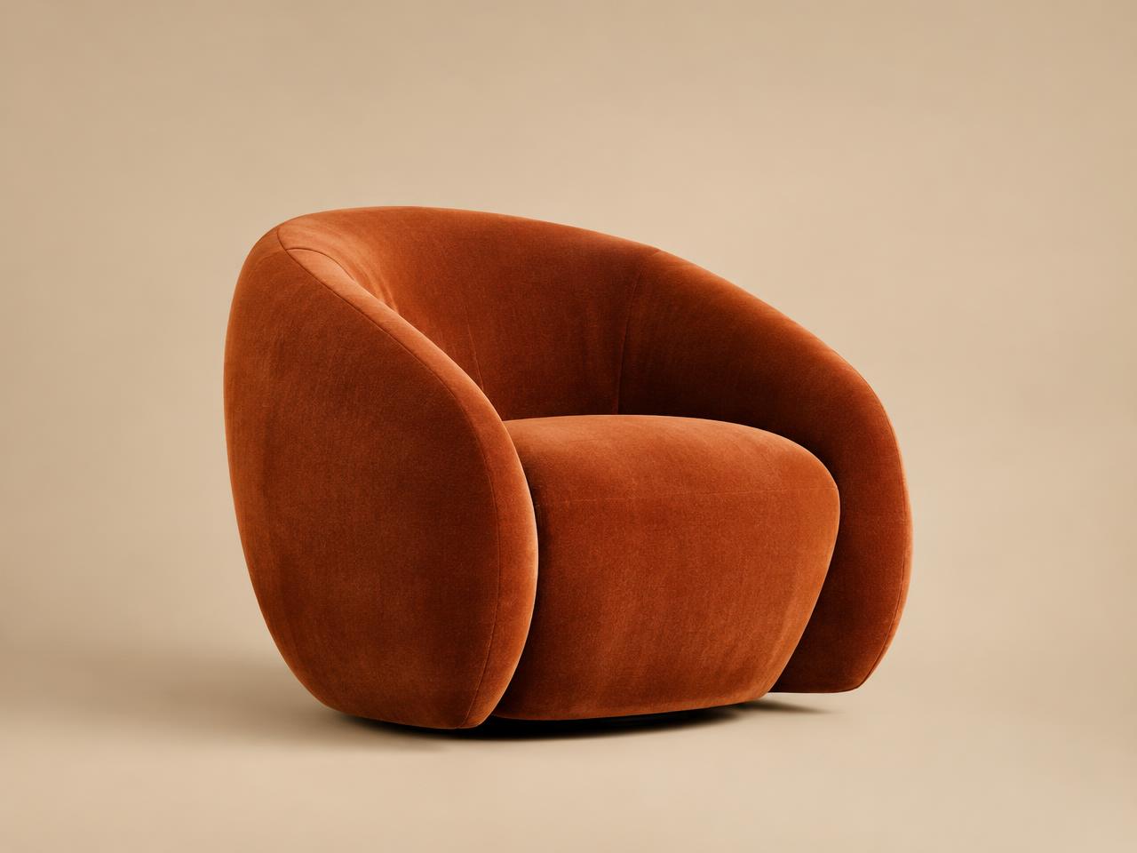 Sculptural armchair in rust velvet